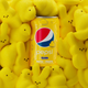 Peeps flavored Pepsi can amid pile of marshmallow Peeps